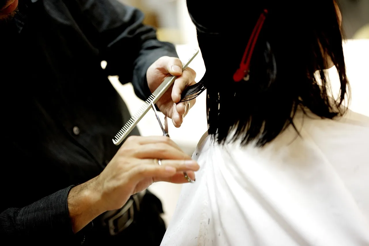 Stylist working with a client in a hair salon